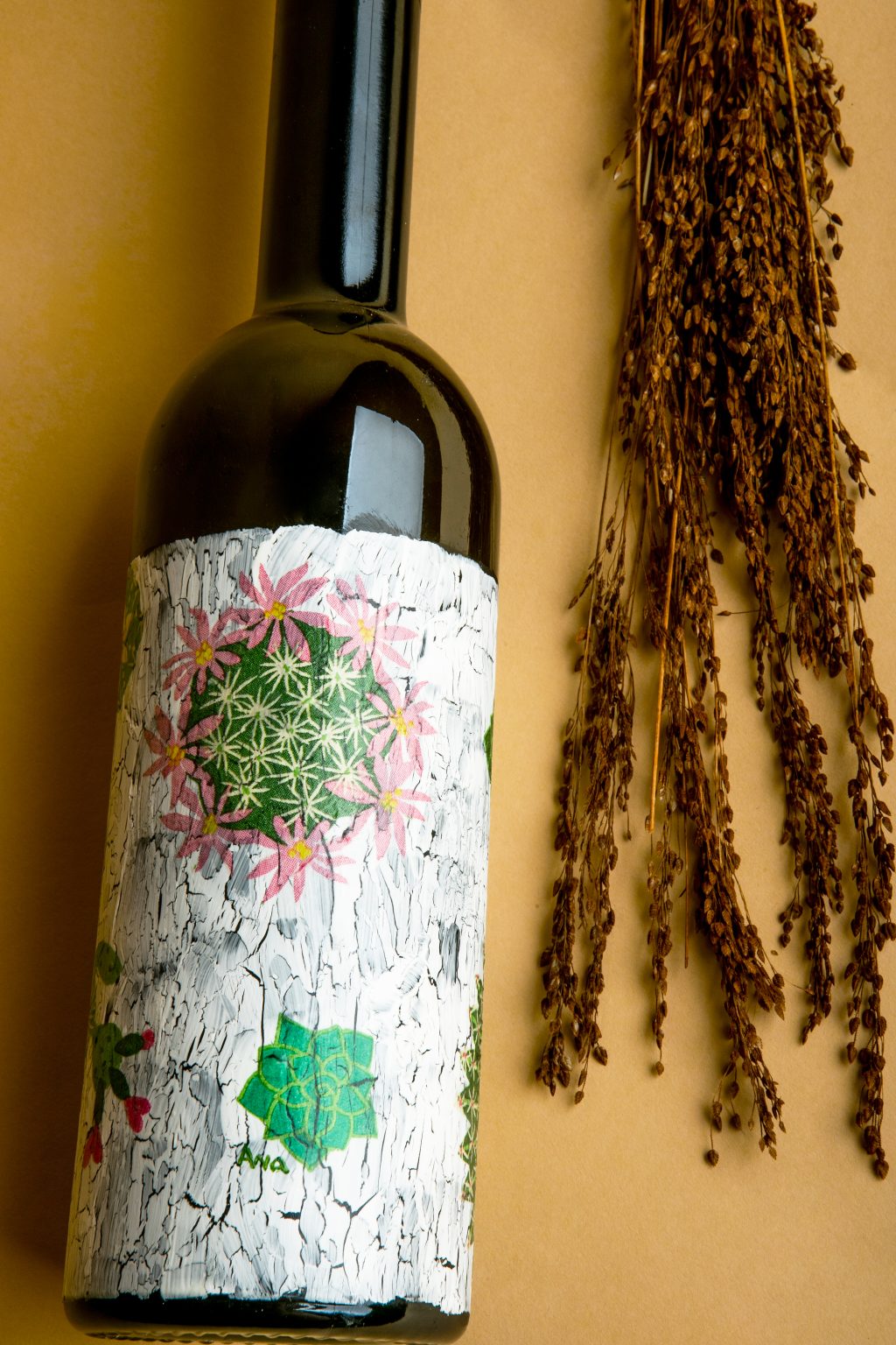 Botella de vidrio decorado